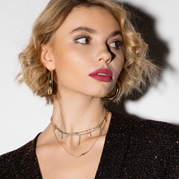 blonde-young-woman-in-golden-hoop-earrings-nfw