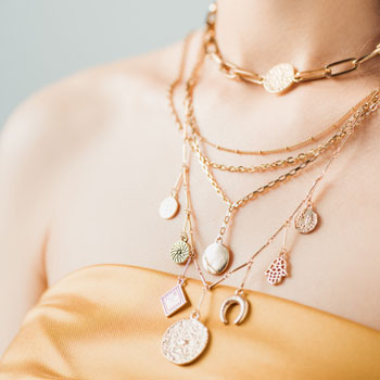 young-woman-with necklaces-nfw